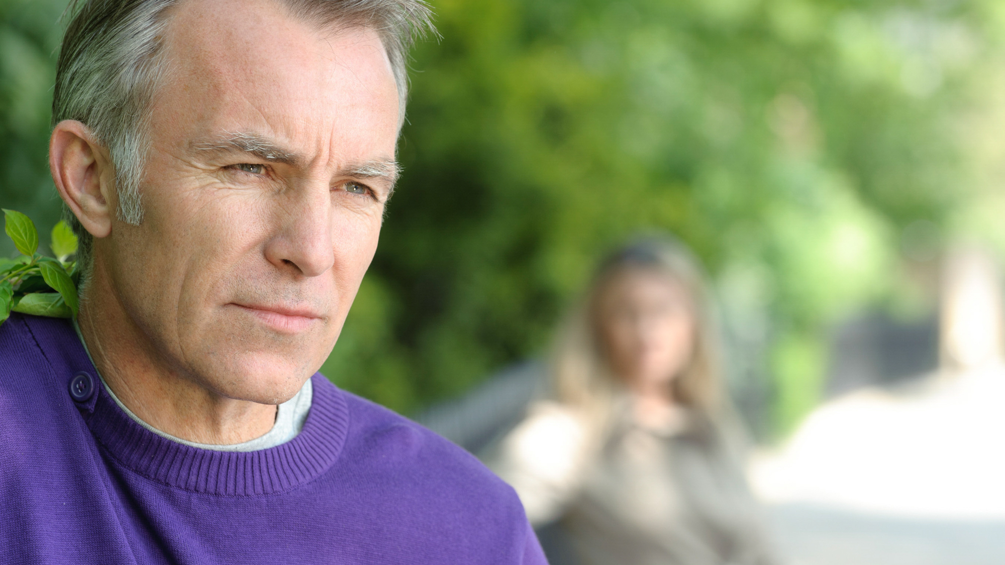 man in a purple shirt