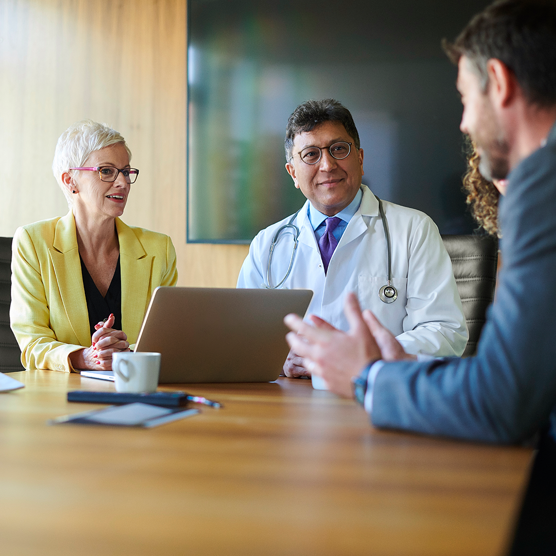 physician in a meeting