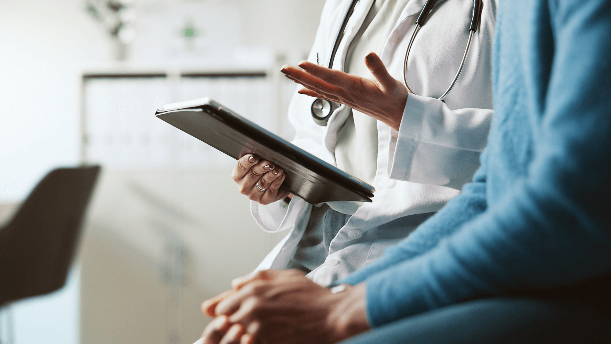 provider and patient shown talking